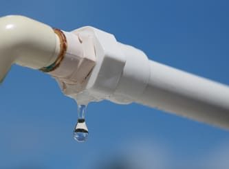 Leaking White Plastic Pipe — Water Management Near Me in Auckland, NZ