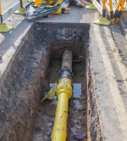 Underground pipe being fixed in trench — NRW Consulting in Auckland, NZ