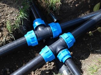 Black Three Way Plastic Water Pipes — Water Management Near Me in Wellington, NZ