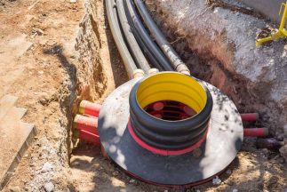 Cables and optical fibres in the digging on a construction site — Leak Detection in Auckland, NZ