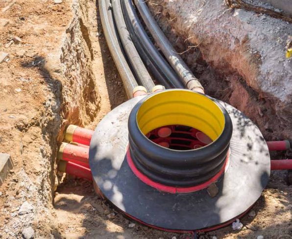 Cables and optical fibres in the digging on a construction site — Leak Detection in Auckland, NZ
