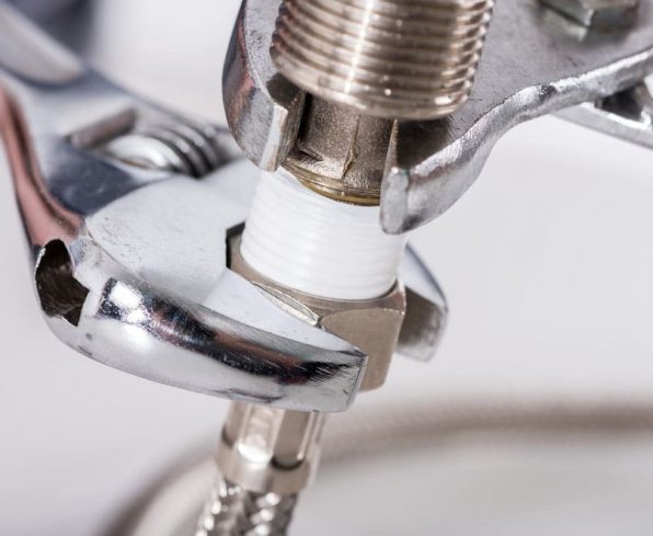 Plumber screwing plumbing fittings — Blog in Auckland, NZ