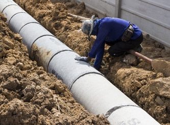 Worker Installing Concrete Manhole — Water Management Near Me in Wellington, NZ